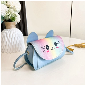 Detail of cute cat face and rainbow glitter flap on light blue leather girls' bag