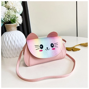 Detail of pink cat-shaped girls crossbody bag with glitter rainbow flap and cute ears