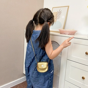 Toddler girl gold crocodile texture mini crossbody bag with silver buckle and thin strap