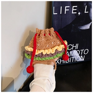 Detail of creative crochet hamburger drawstring bag with multi-color yarn layers