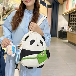 Cute panda cartoon mini backpack with green accessory bag and round character charm