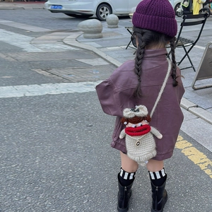 Handmade crochet cartoon shoulder bag for girls featuring funny red lips and a bow
