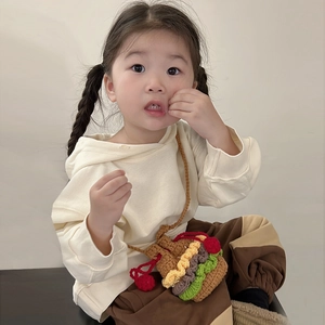 Cute hamburger crochet bucket bag shown with child waffle hoodie and joggers