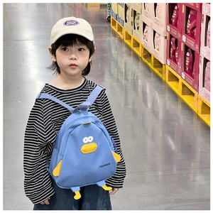 Close-up of cute sky blue cartoon chick canvas backpack featuring 3D yellow duck details