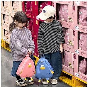 Rear view of children wearing cute yellow duck cartoon backpacks in pink and blue versions