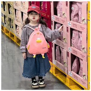 Pink kids backpack with yellow cartoon duck detail worn by child in daily scenario