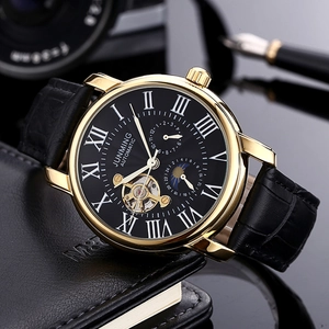 Montre automatique homme dorée avec bracelet cuir noir et affichage des phases de lune