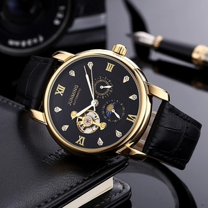 Business automatic mechanical watch with black leather strap and gold diamond-set dial