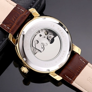 Close-up of skeleton watch case back with visible automatic mechanical movement gears