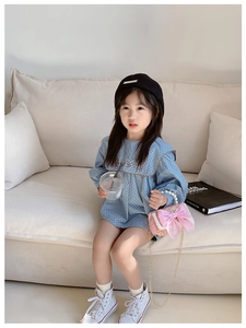 Fashionable girls' outfit with blue polka dot dress and pink bow pearl handle bag
