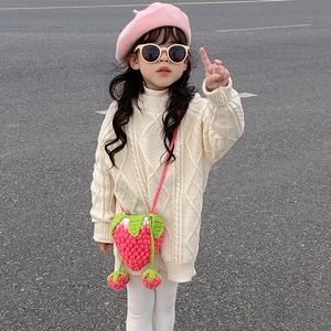 Pink handmade crochet strawberry shoulder bag with green leaf detail for kids