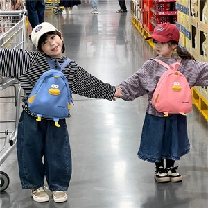 Cute cartoon duck canvas backpack for kids in pink and blue for travel and school