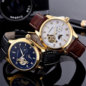 Detail of luxury automatic mechanical watches with leather straps and tourbillon design