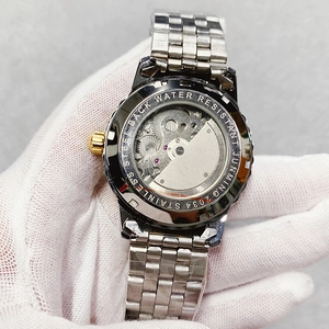 Detailed view of automatic mechanical watch movement through transparent case back