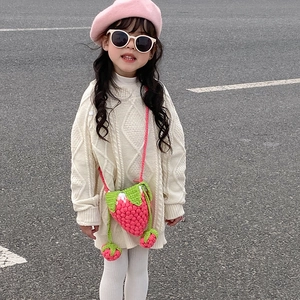 Handmade crochet strawberry crossbody bag for kids with green leaves and white flowers