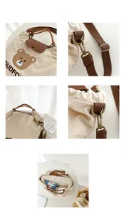Detail view of canvas bucket bag showing bear embroidery and large inner capacity