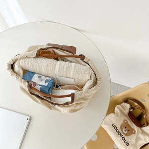 Minimalist canvas tote bag for kids with cute bear patch and contrasting brown handles