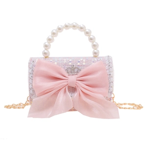 Pink sequin tweed crossbody bag for girls with large bow and pearl handle