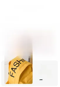 Detail view of yellow canvas kids bag showing fashion letter print and zipper quality