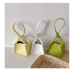 Mini PU leather tote bags for girls with knotted handles in yellow, white, and green