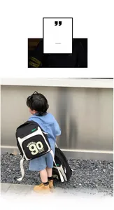 Présentation d'un sac à dos sport noir et blanc pour enfants avec motifs basketball