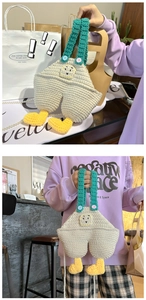 Handmade crochet overall-shaped bag with cartoon face and stylish pearl chain strap