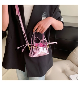 Mini metallic pink shell bag with Fashion & Bags text and drawstring inner lining