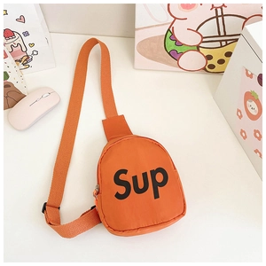 Detail of orange canvas chest bag with adjustable strap and bold letter printing