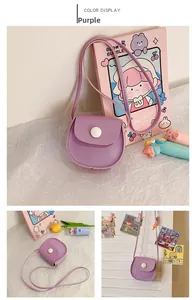 Detail view of purple PU leather kids mini crossbody bag with white snap button closure