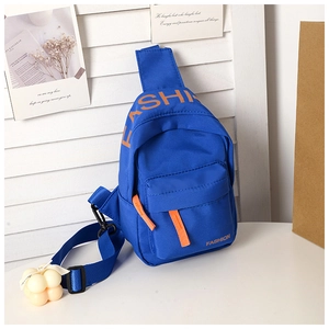 Detail of blue canvas kids chest bag with orange fashion print and cute cloud pendant