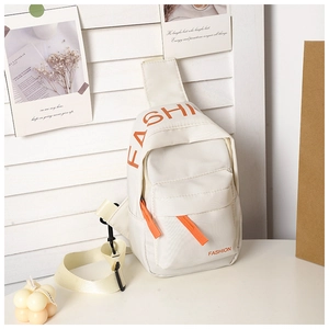 Detail of white nylon crossbody bag for kids with orange lettering and zipper