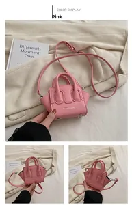 Mini borsa a mano rosa a forma di ala di pipistrello per bambine con tracolla sottile