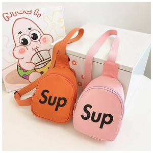 Detail of orange and pink canvas chest bags for kids with adjustable woven straps and logo