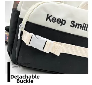 Close-up of detachable white buckle and durable strap on canvas school backpack