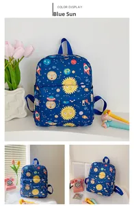 Detail view of blue canvas kids backpack with cartoon space solar system patterns