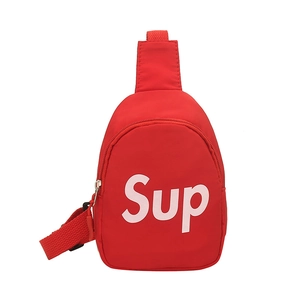 Kids red canvas chest bag with white Sup lettering and adjustable strap for casual outings