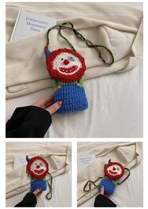 Detailed close-up of handmade crochet clown crossbody bag with colorful knit patterns