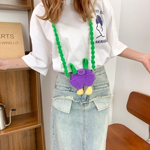 Handmade knitted crossbody bag in cute overalls design with green braided strap for kids
