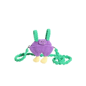 Handmade crochet overall-shaped shoulder bag for kids in purple with green straps
