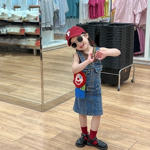Kids denim overall set with crochet clown bag and red baseball cap for stylish summer wear