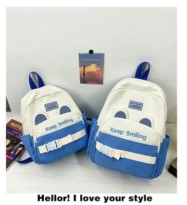 Comparison of two canvas kindergarten backpacks in standard and mini sizes