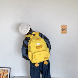 Cartoon duck yellow canvas backpack for kids featuring unique flat bill and webbed feet