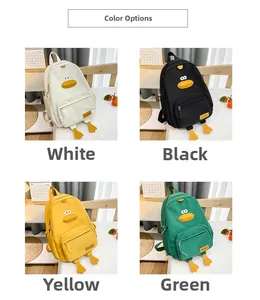 Four colors of cute cartoon duck canvas backpacks for kids including yellow and green