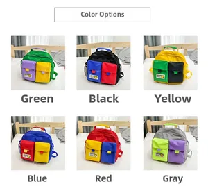 Detail view of six color-block canvas backpacks for kids with cartoon bear patches