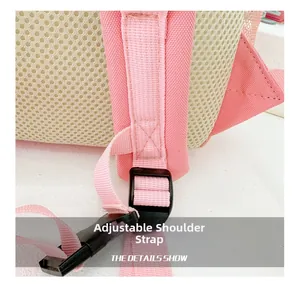 Detail of breathable mesh back and adjustable pink straps on kids canvas backpack