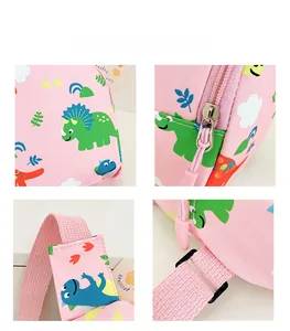Detailed views of pink dinosaur crossbody bag showing quality zippers and reinforced straps