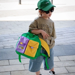 Lightweight color-block canvas kids backpack with green body and contrast pocket details