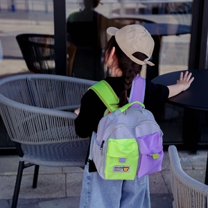 Kids lightweight canvas backpack featuring stylish contrast colors and breathable side pockets