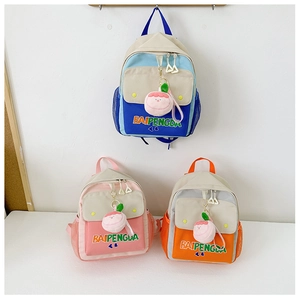 Detail of colorful canvas backpacks for toddlers featuring mesh pockets and peach charms