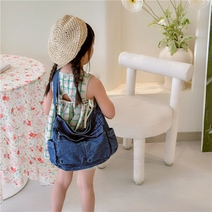 Girl's stylish denim crossbody bag with side pockets for fashionable kids' daily accessory